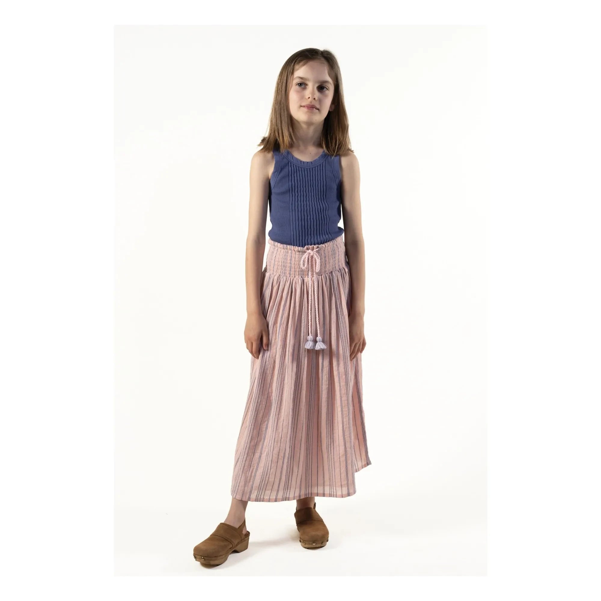 Sunchild - Página de la falda rosa polvorienta