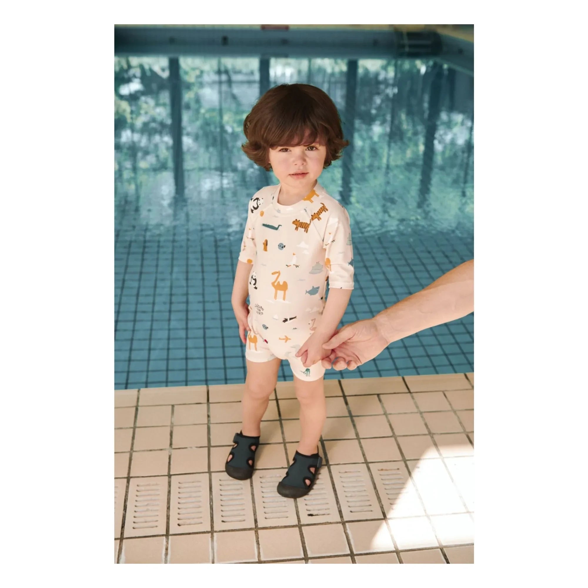 Liewood - Traje de baño Thor Animal con protección UV de fibras recicladas | Beige