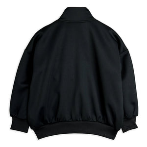 Mini Rodini - Chaqueta de chándal con parche de fibra reciclada | Negro