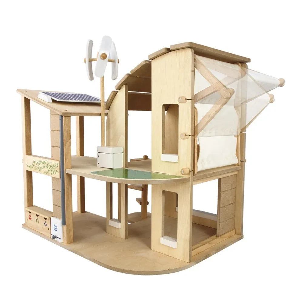 Plan Toys - Casa de muñecas amueblada ecológica