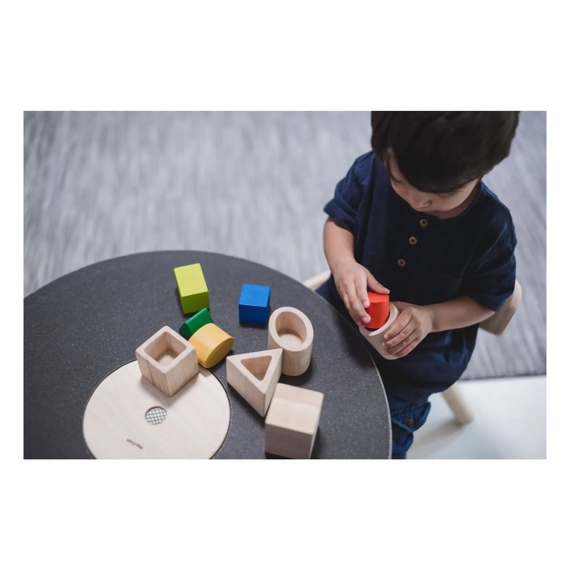 Plan Toys - Formas geométricas encajables