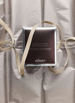 AIME - La Touche Finale Roll-On Perfume y Mini Máscara Set