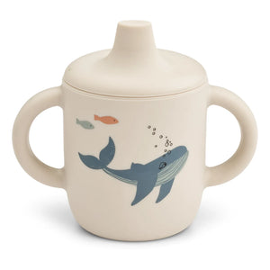 Liewood - Vaso de aprendizaje de silicona Neil | Criaturas marinas/Color arena
