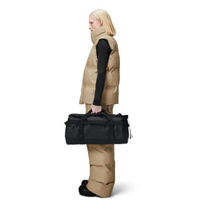 Rains - Bolsa de lona pequeña Texel | Negro