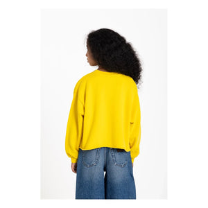 Sudadera BAY de algodón orgánico con el dedo en la nariz | Amarilla