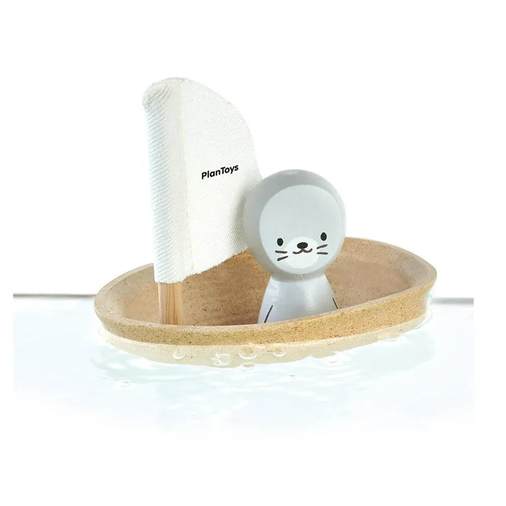 Plan Toys - Bote Foca para bebé flotante