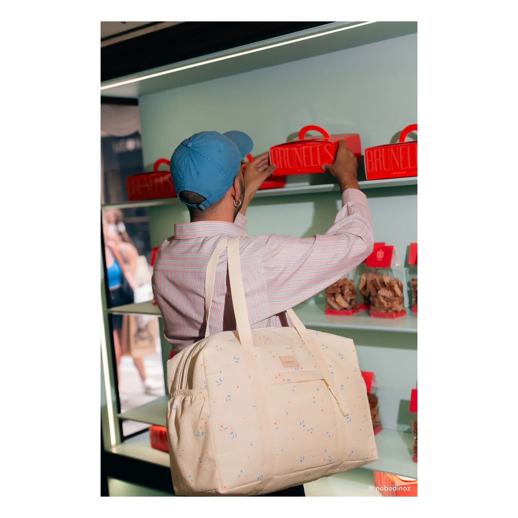 Nobodinoz - Bolso cambiador impermeable Opera Orange Cherries | Beige