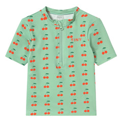 Tinycottons - Camiseta de baño con protección UV de cerezas | agua verde