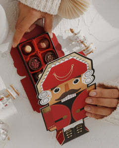 Dinossi - Bombones belgas de Navidad en caja Cascanueces