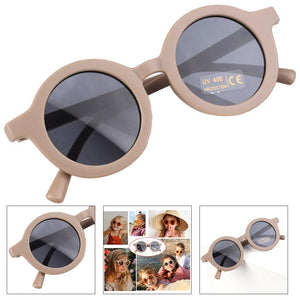 Dinossi - Gafas de sol redondas sostenibles de color marrón para niños