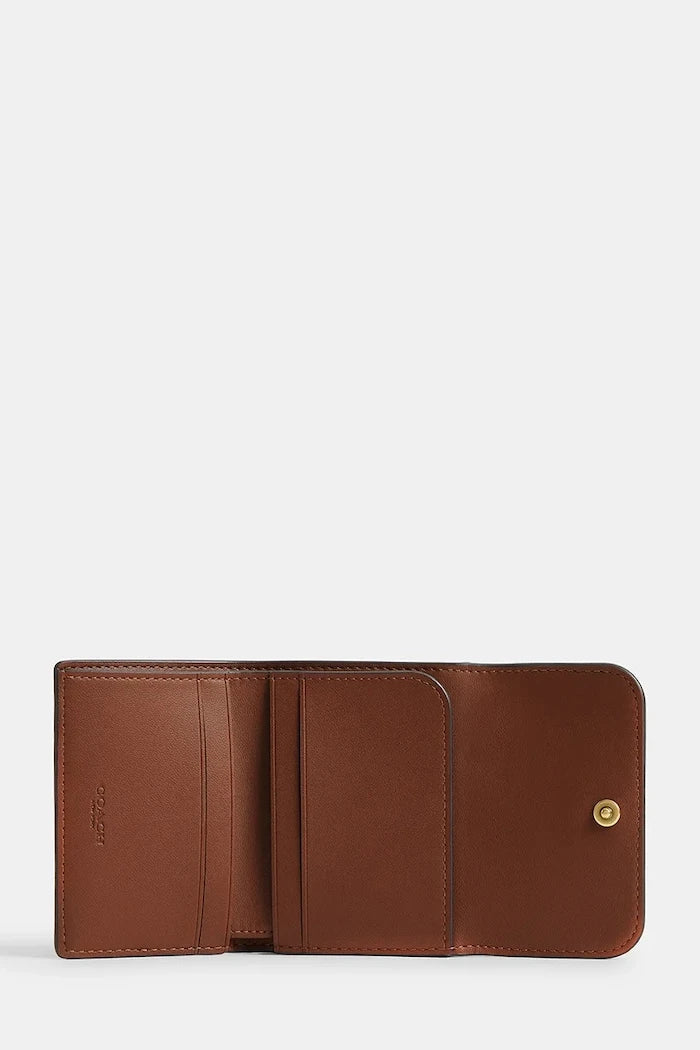 Tarjetero de cuero tipo cartera Coach para mujer
