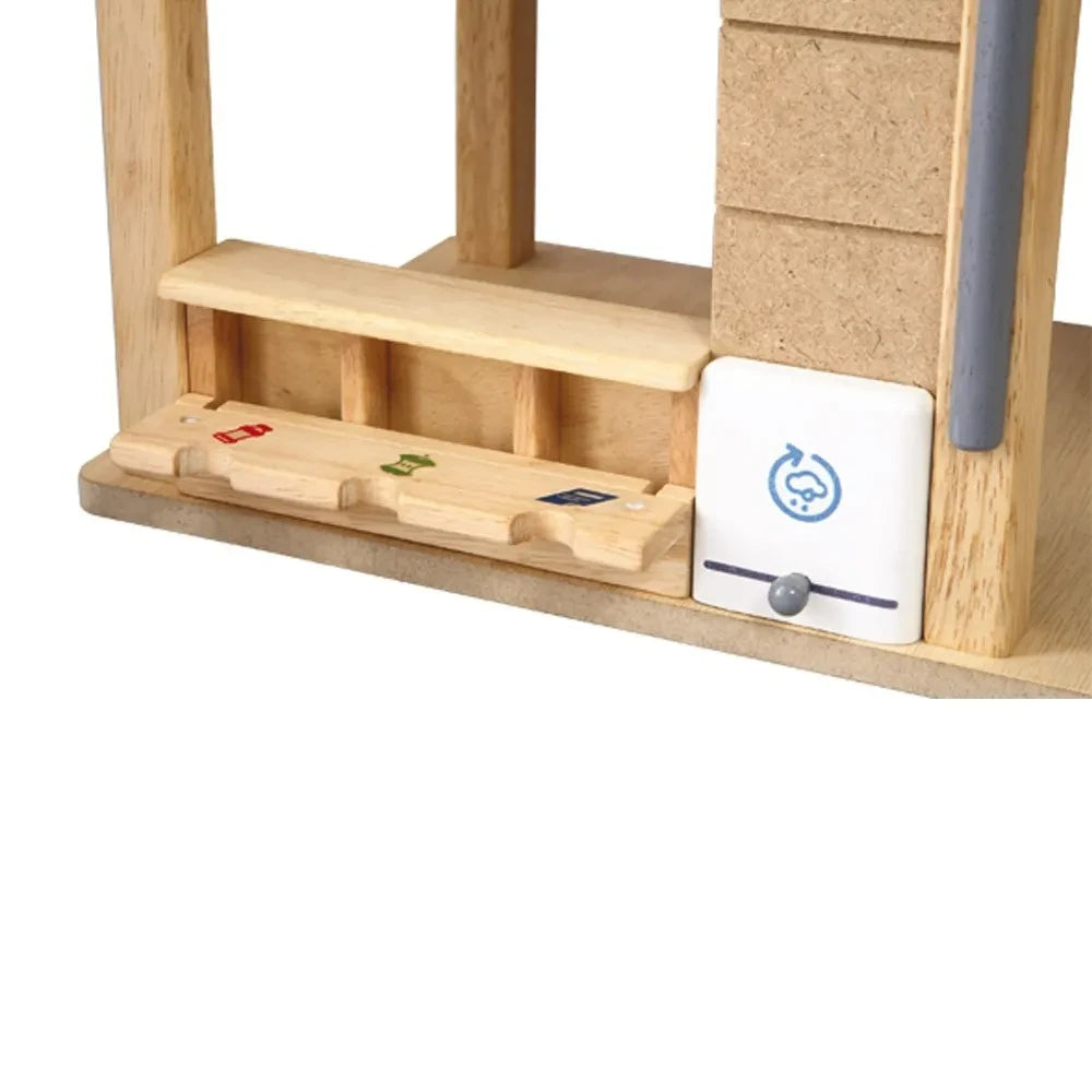 Plan Toys - Casa de muñecas amueblada ecológica