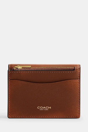 Tarjetero de cuero tipo cartera Coach para mujer