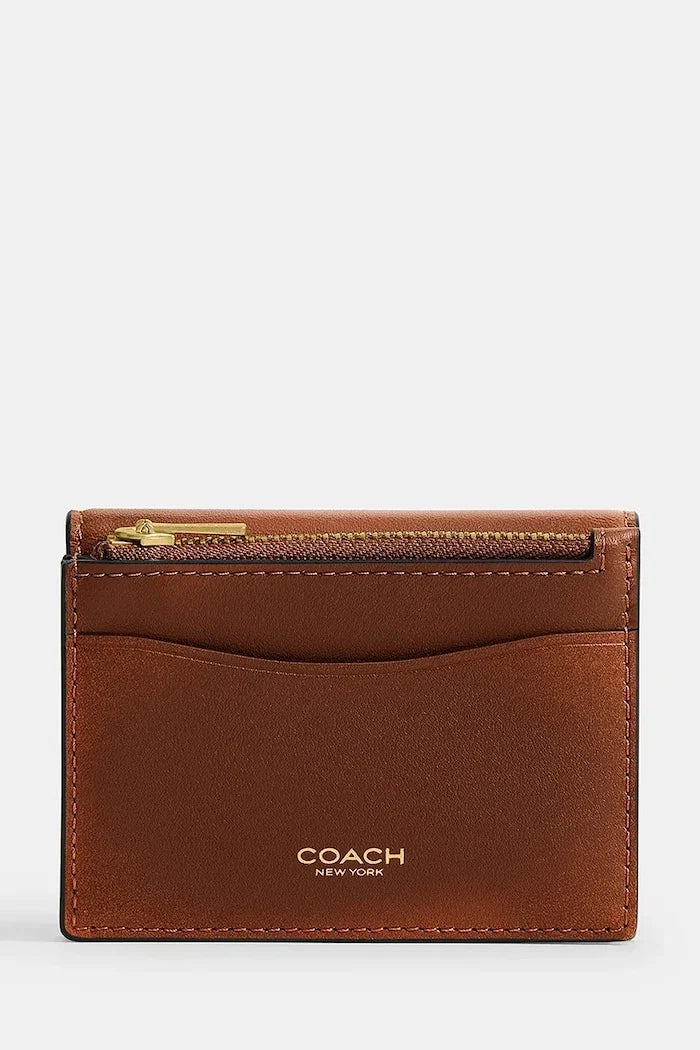 Tarjetero de cuero tipo cartera Coach para mujer