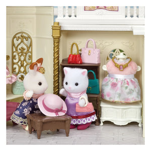 Sylvanian Families - Maleta de moda y hermana mayor Gata Persa