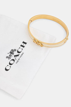 Pulsera de arroz Coach para mujer