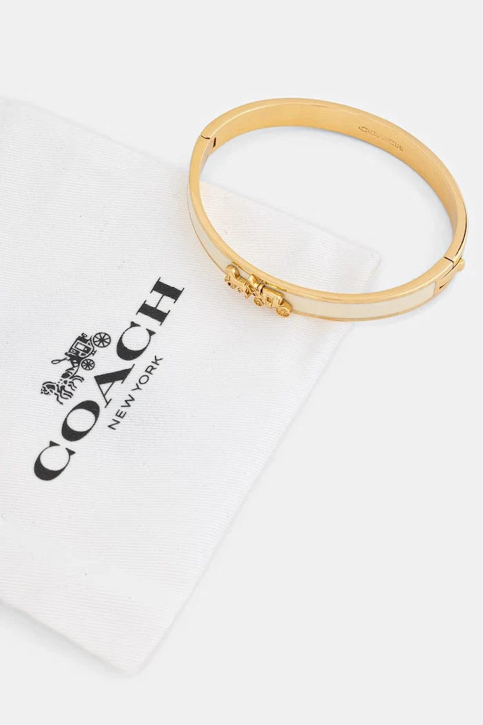 Pulsera de arroz Coach para mujer