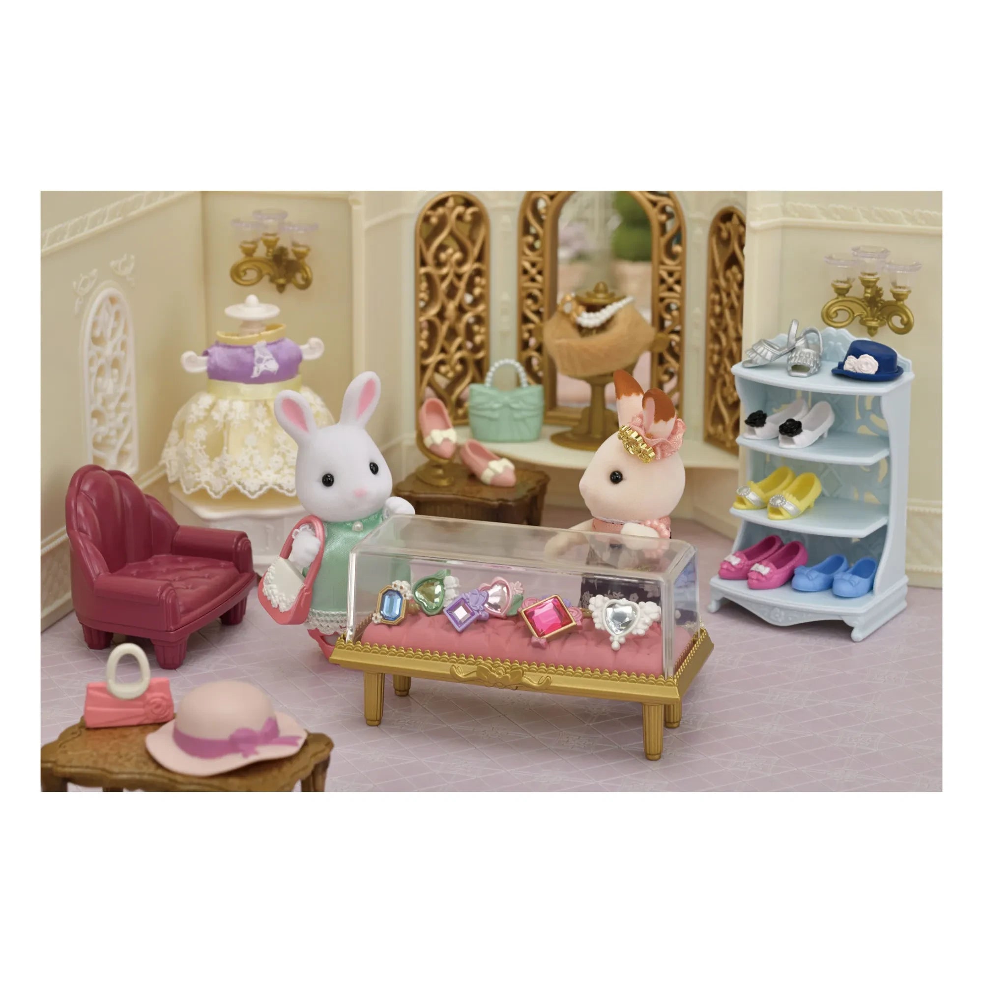 Sylvanian Families - Conejita Hermana Mayor y Maleta de Moda