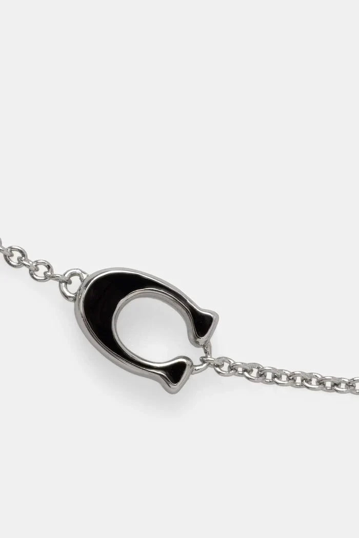 Brazalete metálico de mujer Coach
