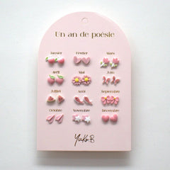 Yuko B. - 12 pares de pendientes de cerámica para niños