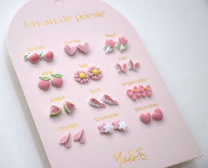 Yuko B. - 12 pares de pendientes de cerámica para niños