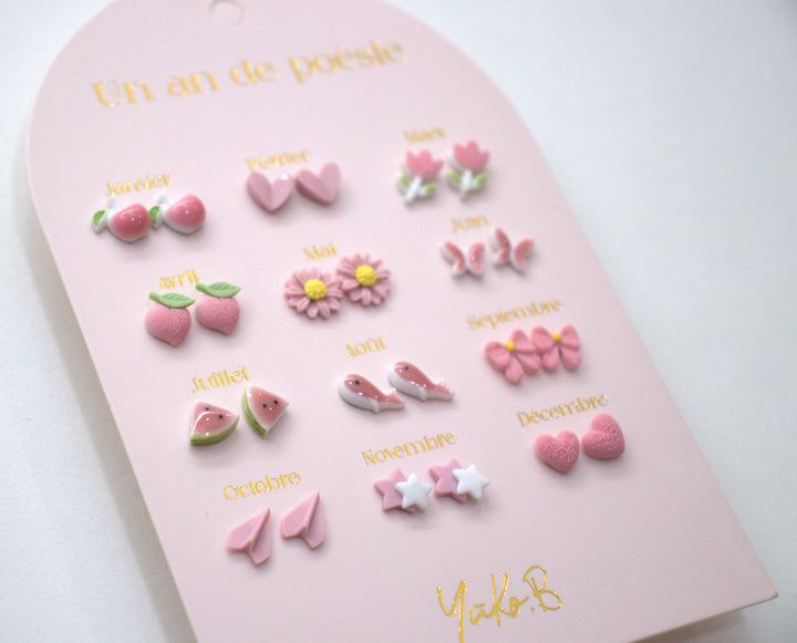 Yuko B. - 12 pares de pendientes de cerámica para niños
