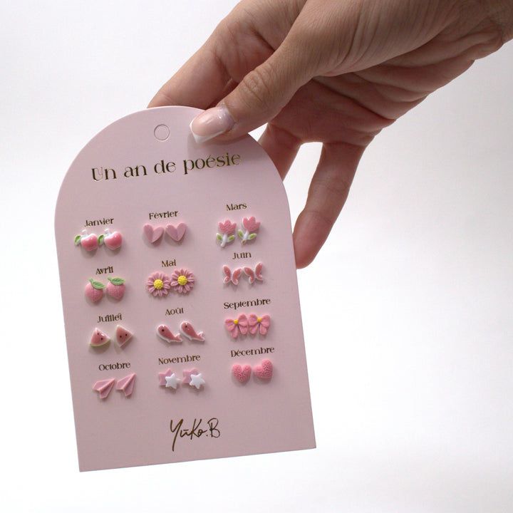 Yuko B. - 12 pares de pendientes de cerámica para niños