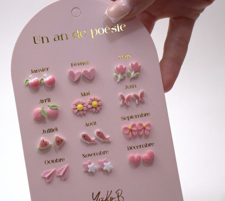 Yuko B. - 12 pares de pendientes de cerámica para niños